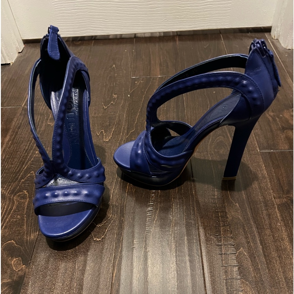 Alexander McQueen blue heels.